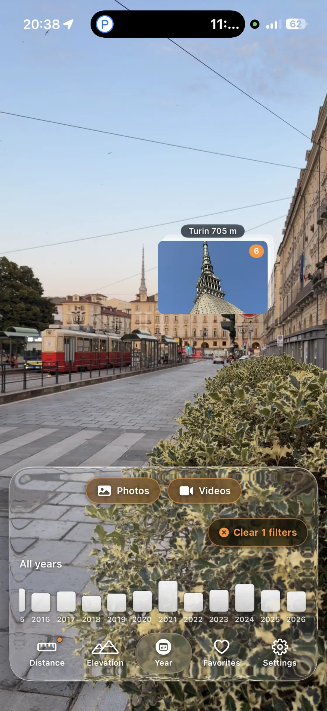 The Mole Antonelliana pinned above a Turin street, 705 metres away