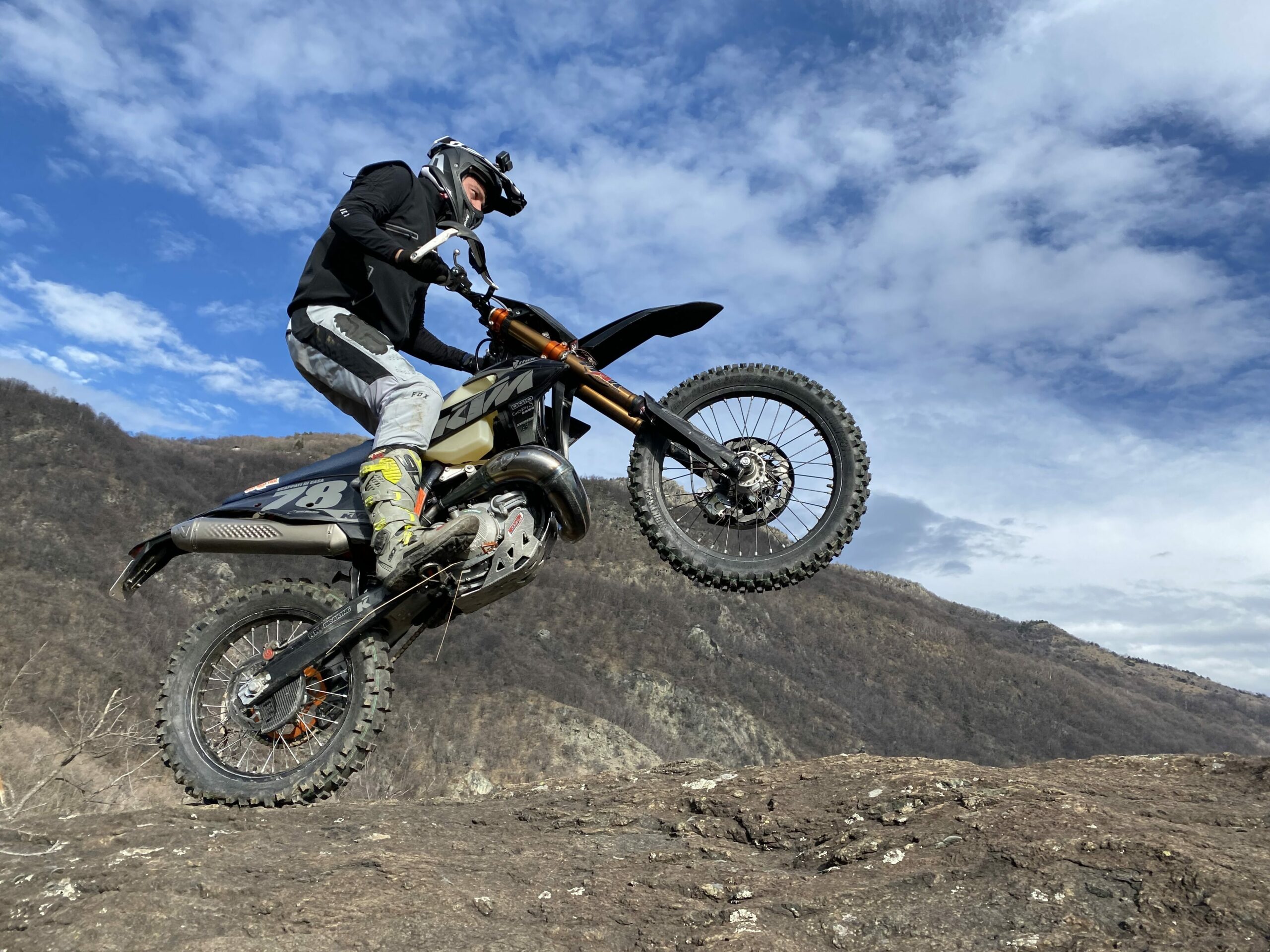 wheelie on a boulder